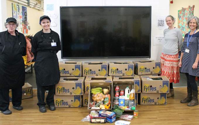 Lousie White, Brittany Harris, Elena Pike and Vicky Rawlings with some of the food hampers
