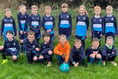 Crediton Youth appreciates business support towards new kits