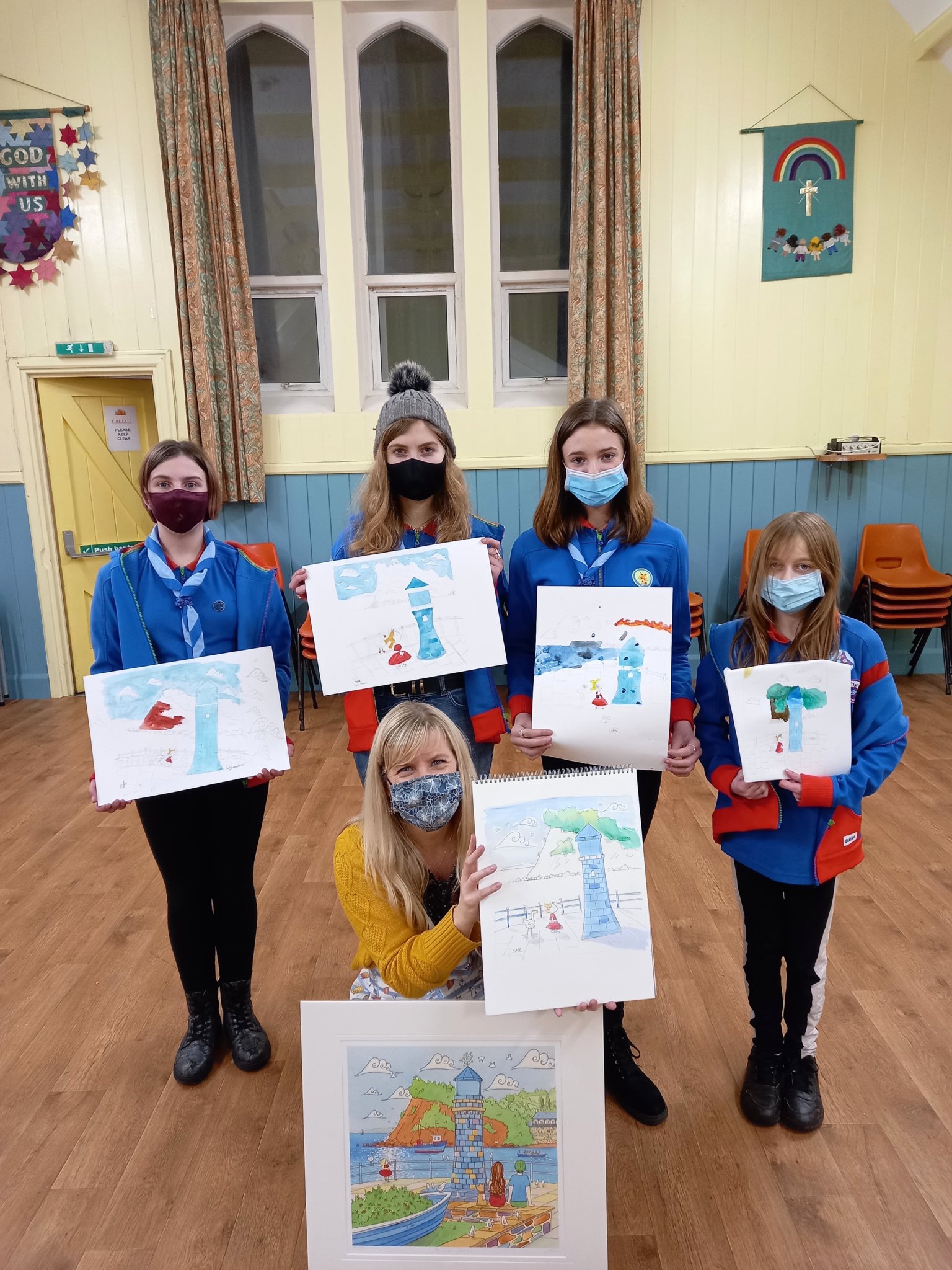 YOUNG ARTISTS: 1st Teignmouth Guides show their paintings after their session with Laura Walls.
Picture: 1st Teignmouth Guides