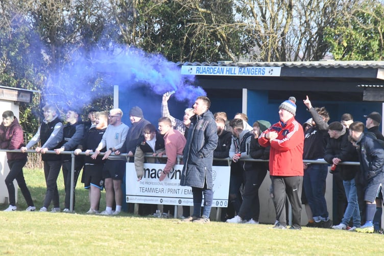n Ruardean fans celebrate the goal that sealed the victory.