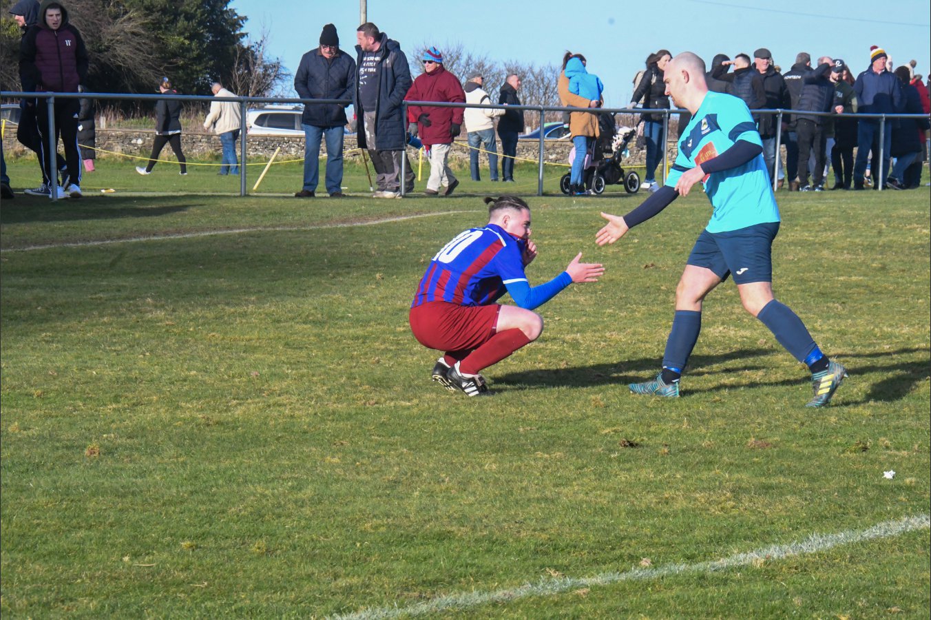 Ruardean Hill Rangers v Broadwell. Les James Cup semi-final. Shaun Tingle commiserates with Dan Brain.