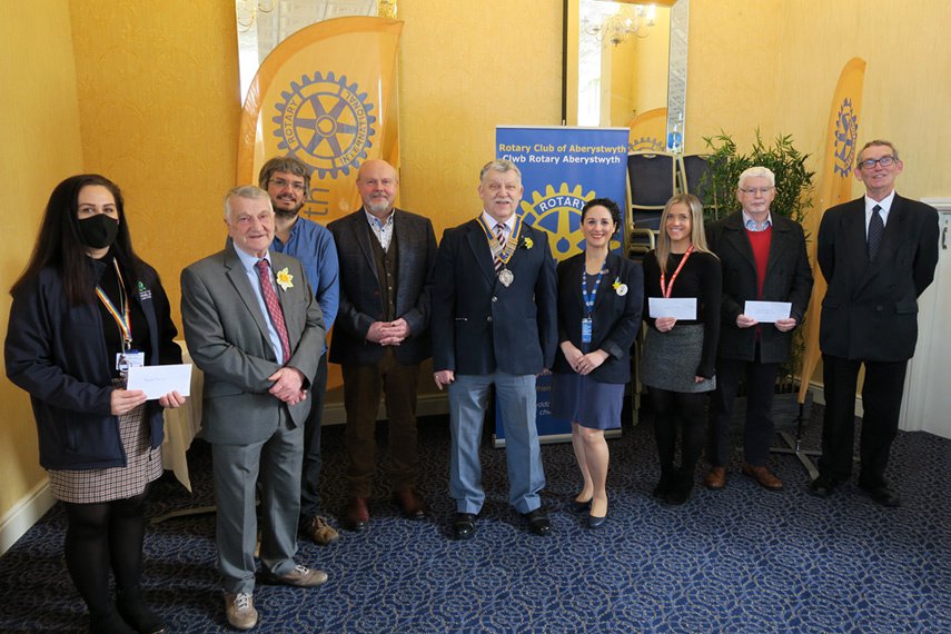 Cheque recipients with the rotarians at the Marine Hotel