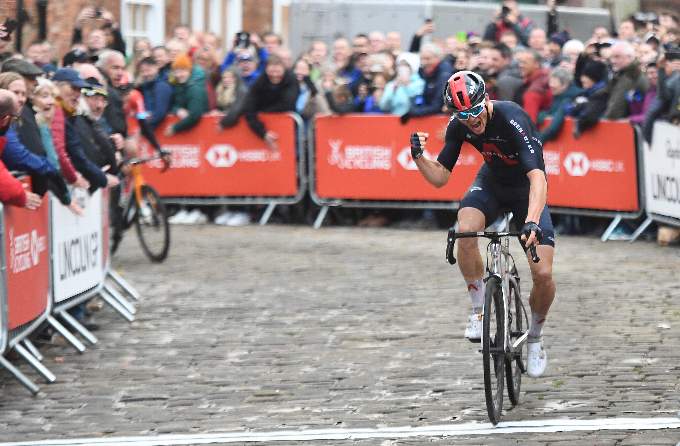 Ben Swift crosses the finish line to win back-to-back British Road Race Championships in Lincoln last October (SWpix.com)