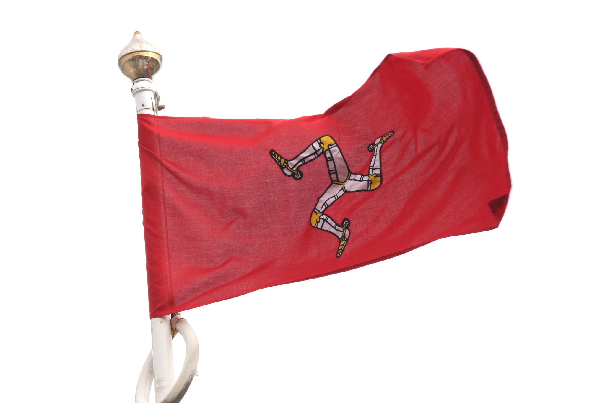 Manx Flag flying in a stiff wind