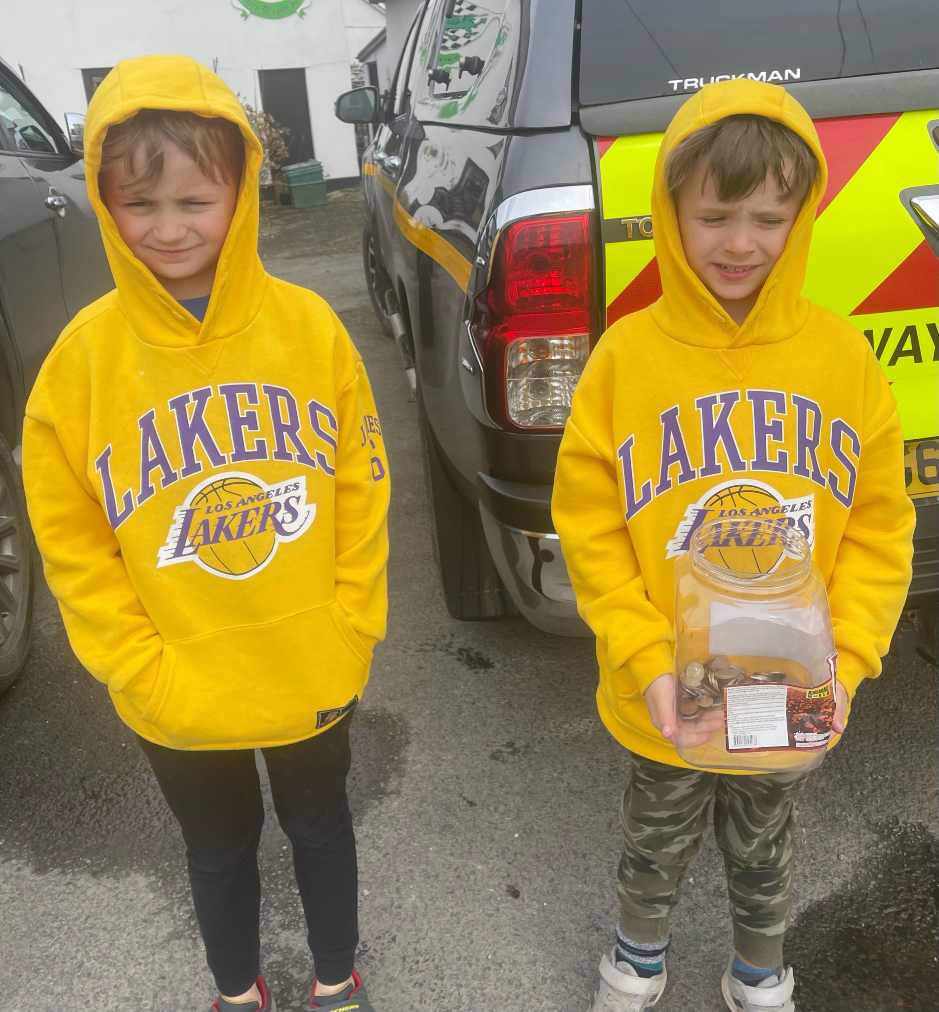 Martin Perry, above, with Viktor Ieromin; Tracey Barratt with the cakes; eight-year-old twins give their pocket money to the cause.
