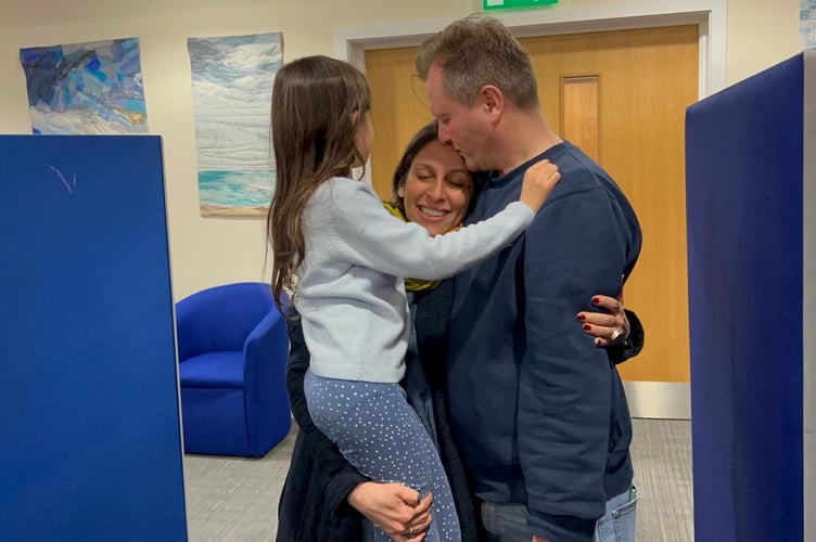 Nazanin Zaghari-Ratcliffe with husband Richard and daughter Gabriella, 7, after being reunited at Heathrow Airport on Thursday, March 17
