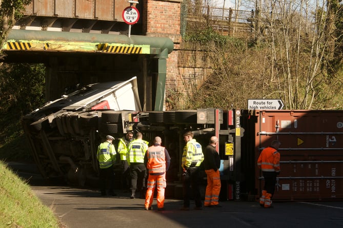 The lorry hit Wrecclesham railway bridge just before 10am on Thursday (March 17)