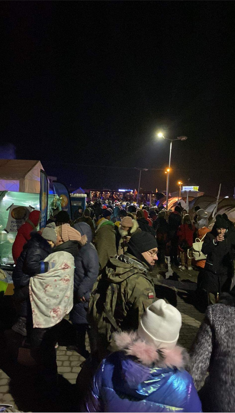 Refugees continuing to wait at night