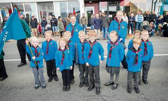 Members of the Bude Cubs gather to pay their respects. Picture: Bob Willingham, Studio Southwest