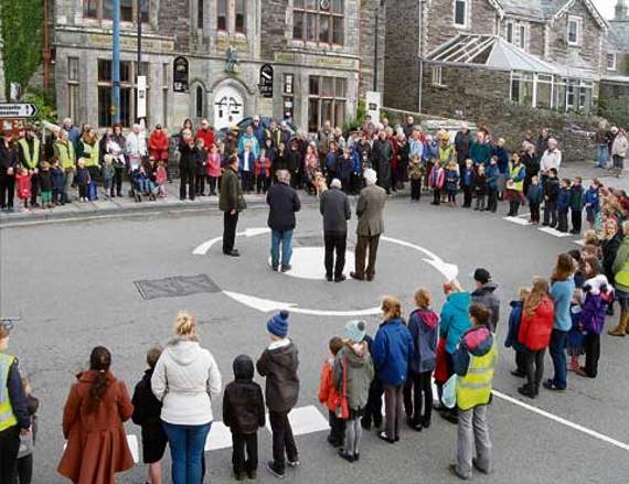 Armistice Day was observed in Tintagel at the Roundabout on Wednesday, November 11. Pictured are the officials in the centre circle, talking to the large crowd, including many school children from Tintagel Community Primary School. With their backs to the camera are Vaughn Williams (Camelford RBL) the Rev Michael Parsons (Tintagel Parish Church), Father Bryan Storey (Tintagel Roman Catholic Church) and Glenton Brown (Tintagel Methodist Church). Picture: David Flower