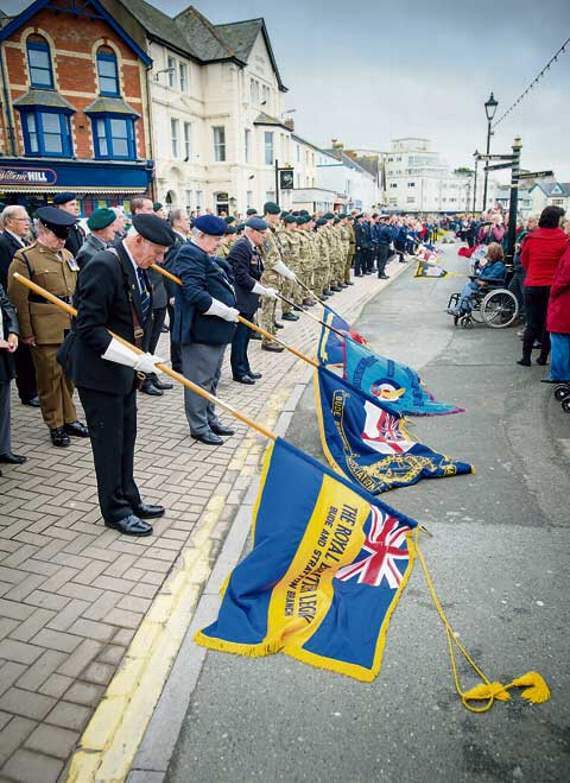 Lowering the standards, from left, Dave Parrott, Bude Royal British Legion, Tanky Williams, Bude Royal Naval Association, Colin Gray, Bude RAF Association, and Matt Cowling, Bude Platoon of the Cornwall ACF. Picture: Bob Willingham, Studio Southwest