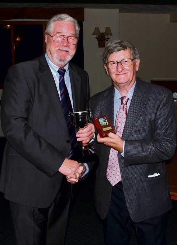 Clubman of the year Mike Barrett (left) was presented with a trophy and the Dave Flower Perpetual Cup by David Flower. Picture: David Flower