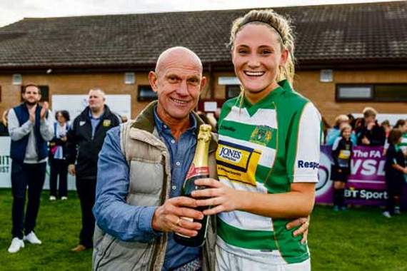PLAYER of the match Ellie Isaac receives a bottle of champagne from match sponsor Thomas J Fudges Bakery after the last game of the season against Durham Women FC.