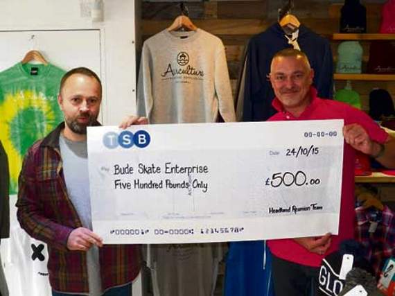 Gary Provan presents a cheque for £500 to Bude Skate Enterprise.