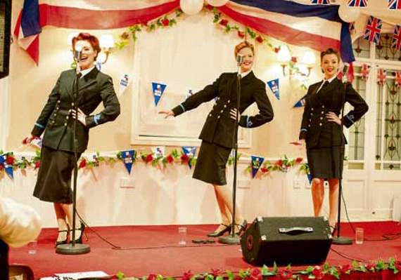 The Three Belles perform.
