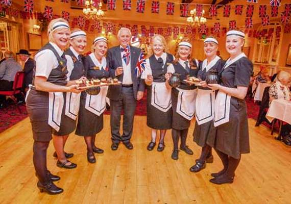 Tim Browning, owner of the Falcon Hotel, along with staff and helpers.