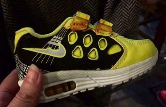The shoe of a small child that had been washed ashore in Lesvos was passed around the room. Picture: Dawn Robinson-Walsh