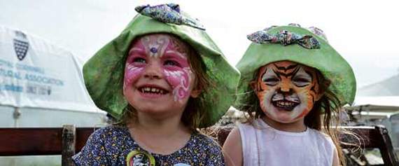 Cousins from Camelford, butterfly Tilly Jerram-Smith and tiger Daisy Hall enjoying the sunshine.