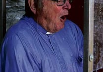 Vicar Michael Parsons receives the ‘cold flush treatment’ at joint parish fete between Boscastle, Trevalga and Tintagel