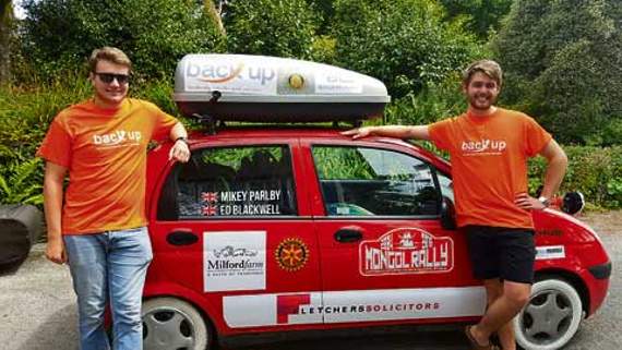 Ed and Mike stand in front of their tiny 0.8 litre car which will hopefully see them travel all the way to Ulaan Baatar, the capital city of Mongolia and end in Ulan Ude in Russia.