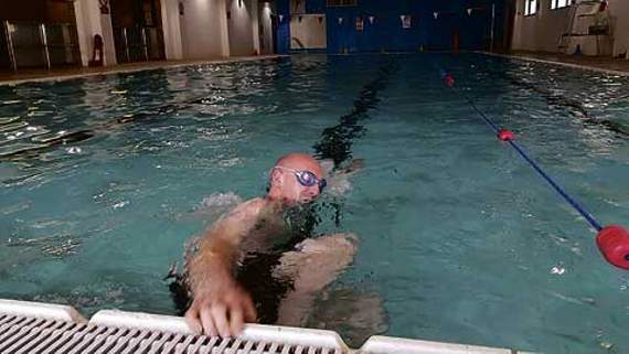 Adam in action in the pool.