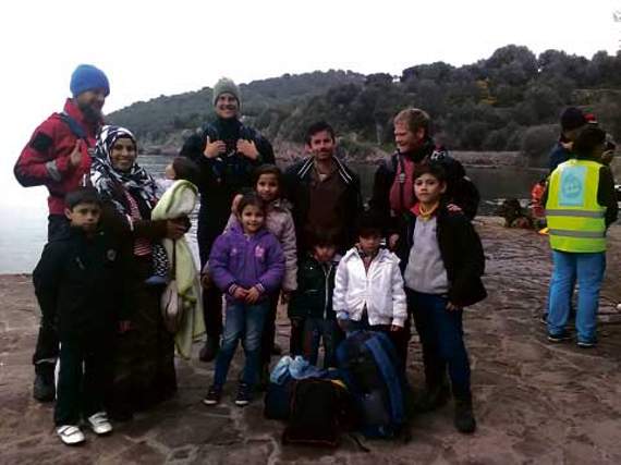 Volunteers with Refugee Rescue recently helped a family with seven children safely to shore.