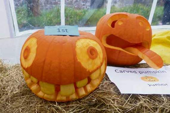 Last year’s winners in the junior carved pumpkin competiton.