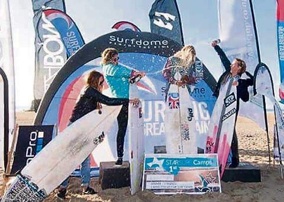 Ellie gets drenched in champagne after winning the British National Championship.