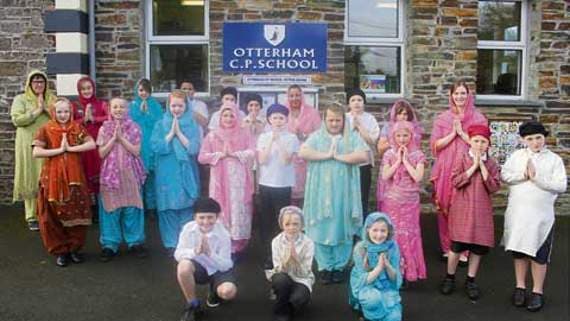 Pupils at Otterham Primary School don traditional clothing as part of workshop on Hinduism 