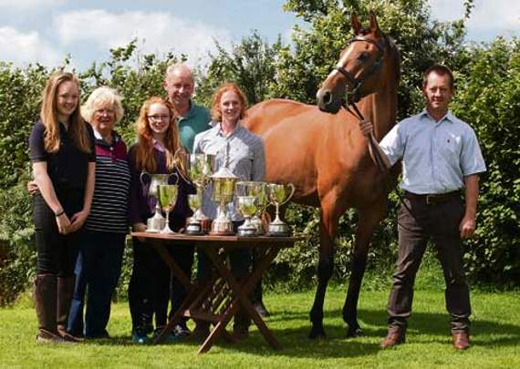 Robin De Souza with his owners at their home in Lewdown.