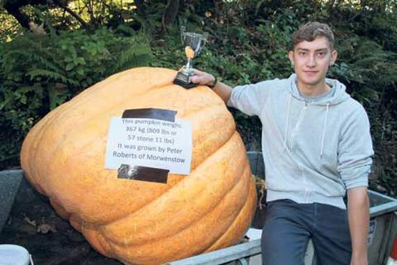 Peter Roberts, from Morwenstow, arrives with the heaviest pumpkin. Picture: Paul Hamlyn