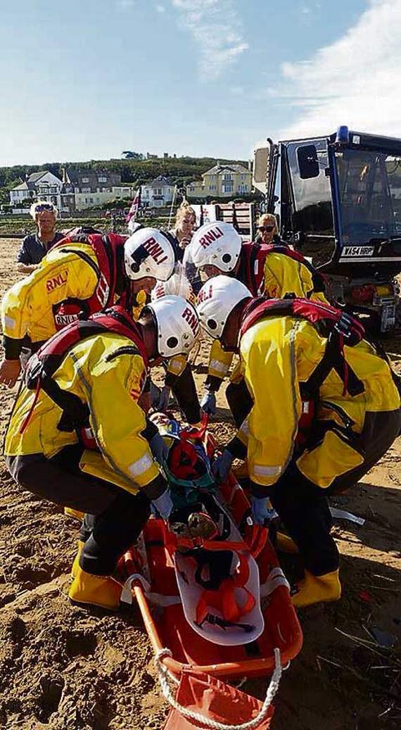 Bude RNLI volunteer lifeboat crew undergo casualty care training at Summerleaze beach.