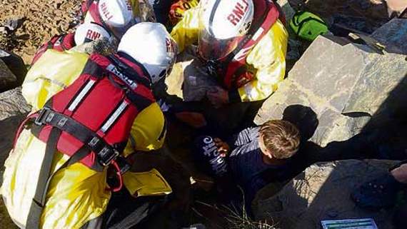 Bude RNLI volunteers take part in a training exercise at Summerleaze beach.