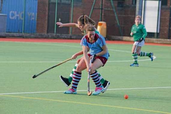 Bude striker, Anna Bury, looks to turn away from her marker during their 7-1 victory over Falmouth seconds at Budehaven School last Saturday afternoon. Picture: Paul Hamlyn