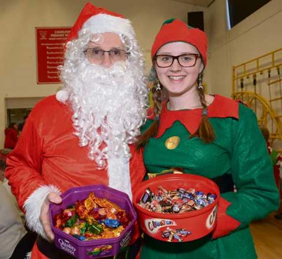 Santa (mayor of Camelford Rob Rotchell) and Olivia Ferguson get ready to hand out some treats.