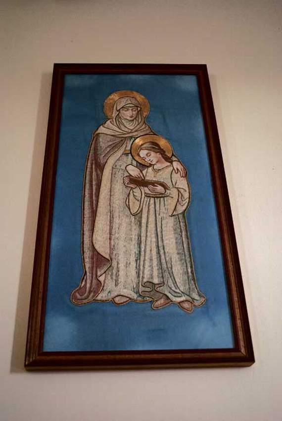 The embroidery of St Anne, embracing the child, Mary, which is mentioned in Tiny Churches.