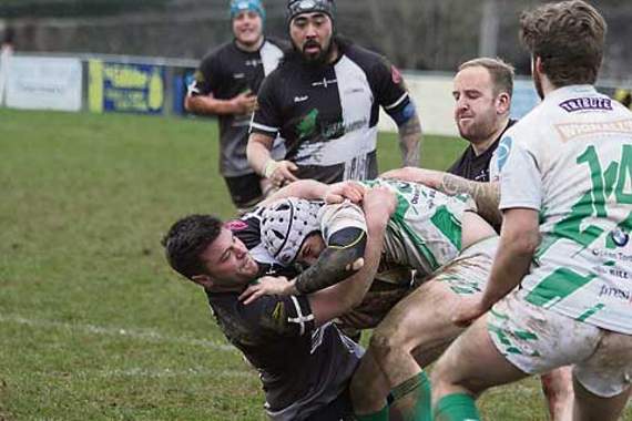 Harry Dawe (left) and Ryan Westren look to blunt the visitors’ attack as the All Blacks ran riot in a dominating first-half performance that saw them score four tries.