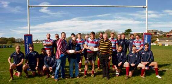 Members of the Trelawny’s Army Supporters Club (TASC) were present at Bude’s Bencoolen Meadow ground to present the club with a couple of training balls in recognition of their winning the Tribute Cornwall & Devon League last season. Picture: Rodney Parrish