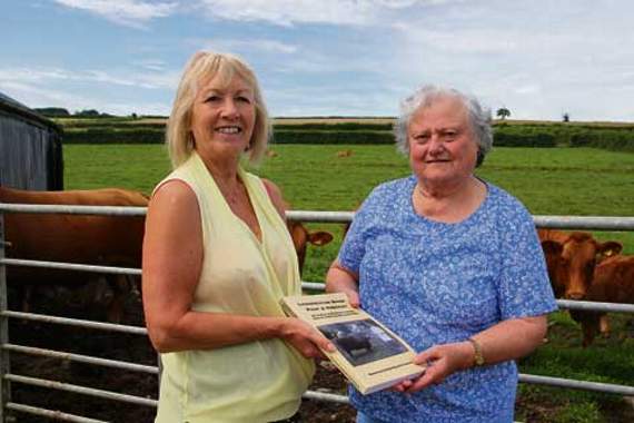 Judy Ward presenting Launceston Show book to Miss R Cundy at Winslade Farm, Lamerton. Pictures: Paul Hamlyn