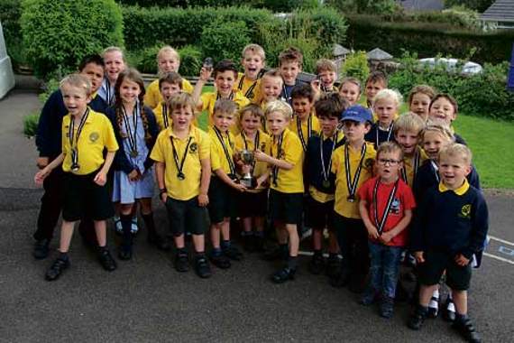 Warbstow Community Primary School won the trophy for most school entries with 35 pupils taking part in the one-mile run. Pictured are just some of the runners.