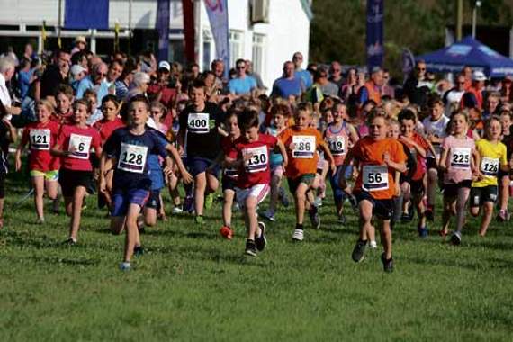 Children from North Cornwall schools taking part in the RNLI junior one-mile race held at Bude Rugby Club.