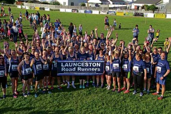 Launceston Road Runners pose for a picture before the start of the main race.