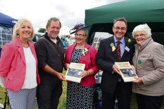 Book winners, Mrs Pam Dummer from Launceston, and Mr N Perkin from Boyton, receiving their books from show president, Leslie Vanstone and his wife. Also pictured is the Post’s Judy Ward.