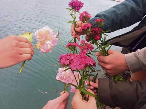 Friends and family took flowers to pay their respects.