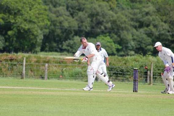 Werrington fourths batsman Nigel Dennis tickles the ball around the corner during his 115 against South Petherwin seconds last Saturday. South Petherwin went on to win by ten wickets thanks to an unbeaten 108 from teenager Taylor Gerry and 74 not out from his father Nick. Picture: Paul Hamlyn