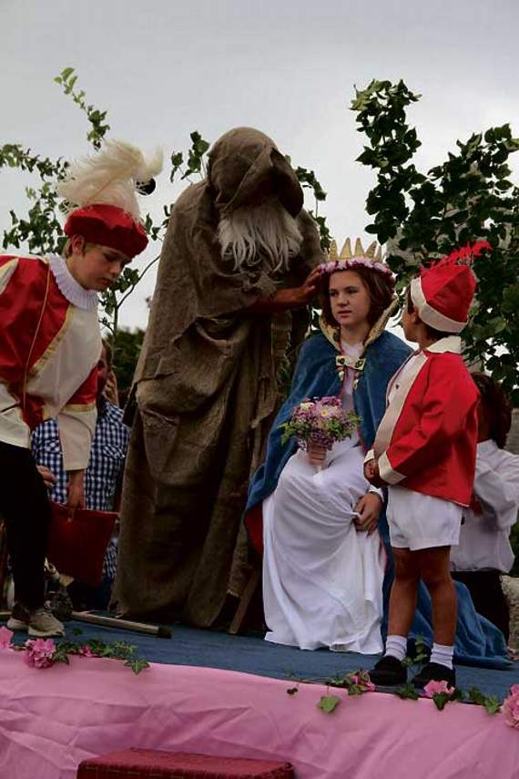 ‘Old Father Time’ crowning this year’s Marhamchurch Revel Queen Kelsi Heywood. Pictures: Paul Hamlyn
