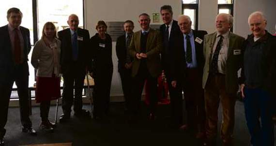 From left: Lifton parish council chairman Chris Edmonds, centre volunteer Mandy Kenyon, centre trustee and chairman Tony Phillips, centre trustee and secretary Vin Marshall, Conservative county councillor for Okehampton rural Kevin Ball, Conservative MP for Torridge and West Devon Geoffrey Cox, the Lord Lieutenant of Devon David Fursdon, centre trustee John Dyke, centre trustee Roger Cheves, and Phil Cleary, husband of Caroline Bradshaw — the Bradshaws gave the land so that the community centre could be built.