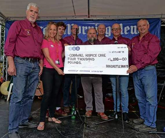 ABOVE: The Boscastle Buoys handed over a cheque for £4,000 for Cornwall Hospice Care to Catherine Robins (Cornwall Hospice Care Community Fundraiser), at the show on Friday.