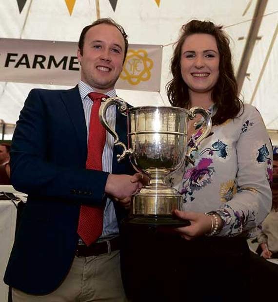 Ed Harris, chairman of Cornwall YFC, presents the trophy for most overall points at the show to Emily Brookham of Launceston YFC.