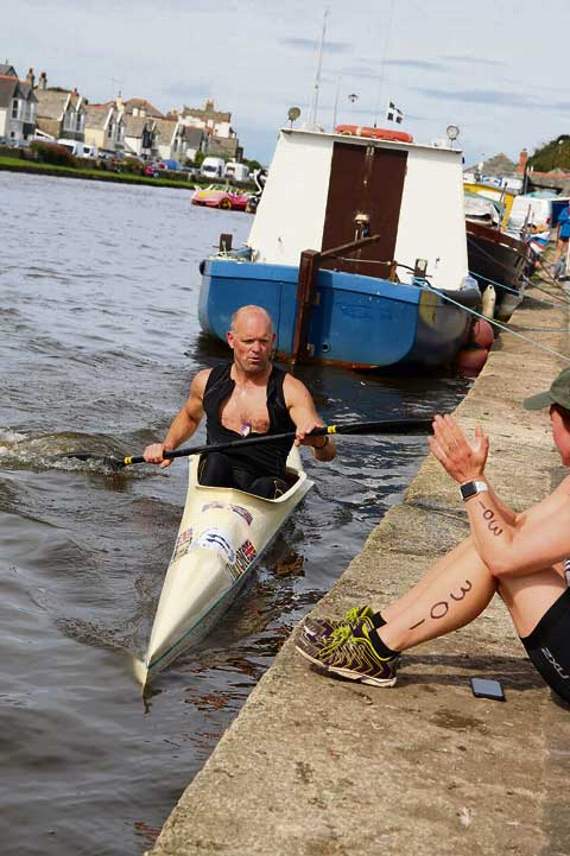 Event organiser Simon Hammond finishing the kayaking leg of the race.